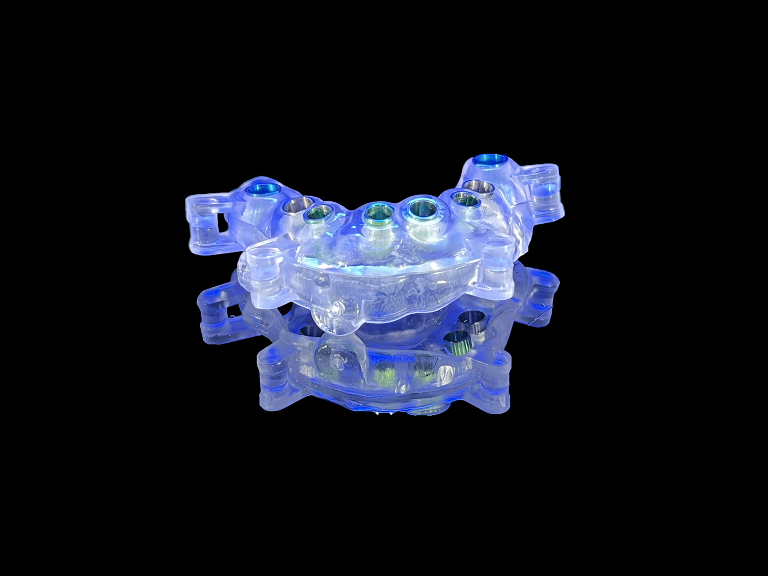 Guide chirurgical transparent avec douilles de forage